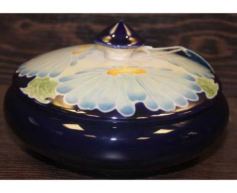 LISA MOORCROFT FOR STAFFORDSHIRE CHELSEA WORKS BURSLEM JAR AND COVER
with stylised floral tube-lined decoration in blue, on a