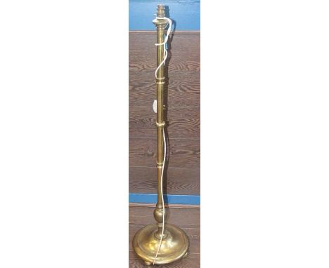 20TH CENTURY BRASS STANDARD LAMP
with a circular base, approximately 123cm high
Brass with some surface wear. 
