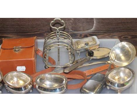 SELECTION OF SILVER PLATED ITEMS
including a set of four salt cellars, a soup ladle, a wine bottle pourer, a small hip flask,