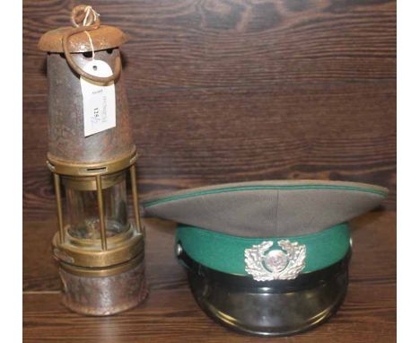 THE WOLF SAFETY LAMP COMPANY MINERS LAMP
together with an East German military hat