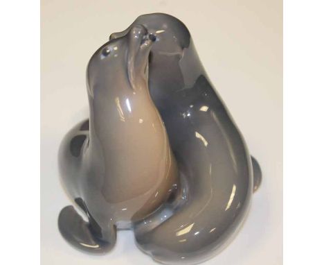ROYAL COPENHAGEN CERAMIC GROUP
modelled as two seals, green mark to base, numbered 2519, 11.5cm high