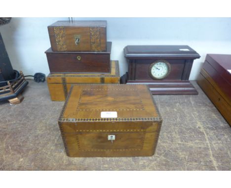 Three inlaid work boxes, one other and a mahogany mantel clock