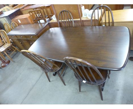 An Ercol six piece dining suite