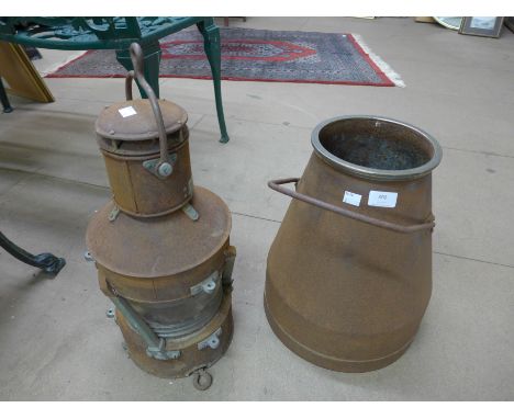 A ship's lamp and a milk churn