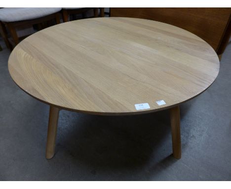 An Ercol style circular coffee table