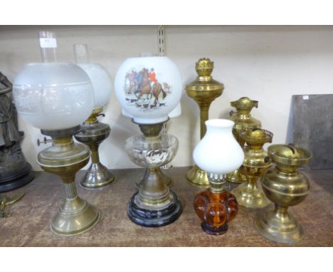 Assorted Victorian and later oil lamps and oil lamp parts