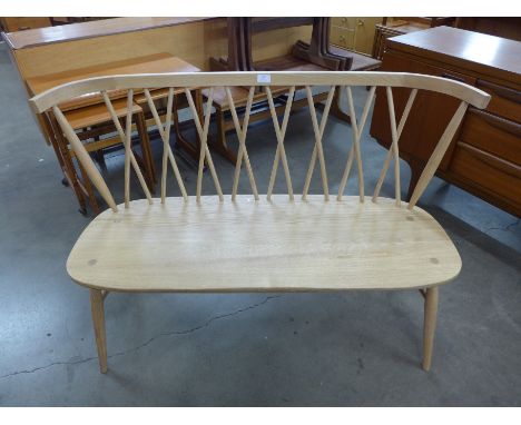 An Ercol lovers seat