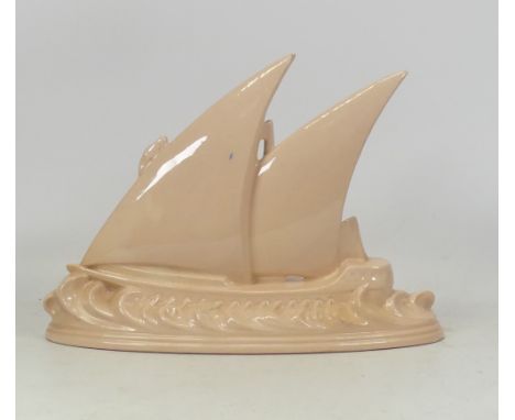Longwy, model of a sailing boat at sea. Black printed backstamp to base. Height 20cm