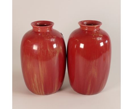 Royal Pilkington Lancastrian, Pair of red mottled glaze vases. Impressed shape number 2128. Height: 20cm (2)