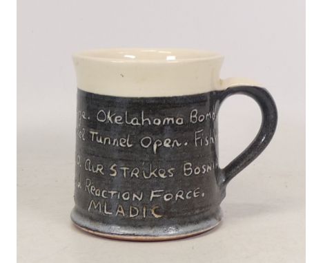Isabella Pope, Studio Pottery Mug with inscribed political events from 1995. Pope was a Master Potter and teacher who created