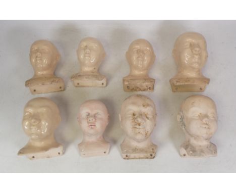 Isabella Pope, Nine Studio Pottery Cushion Doll Heads. Pope was a Master Potter and teacher who created forms inspired by Chi