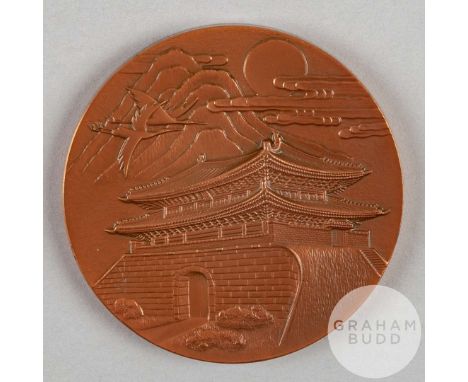 Seoul 1988 Olympic Games participation medal by K. Kwanghyun, bronze, the obverse depicting South Gate below mountain, cloud,