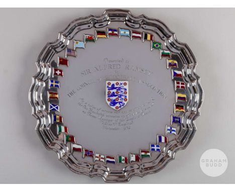 A rare, unique silver and enamel salver presented to Sir Alf Ramsey to commemorate his one hundredth match, managing England,