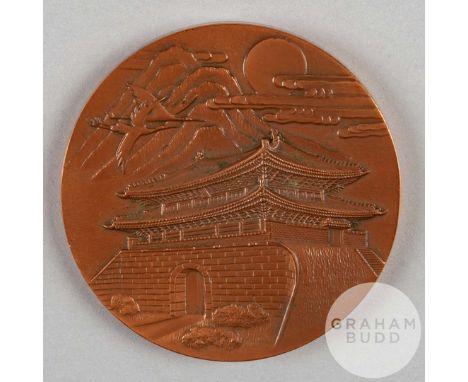 Seoul 1988 Olympic Games participation medal by K. Kwanghyun, bronze, the obverse depicting South Gate below mountain, cloud,