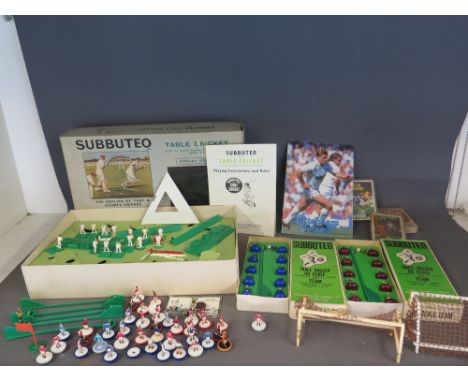 A boxed set of Subbuteo table cricket - display edition, two boxed Subbuteo football teams, various loose players, goal nets 