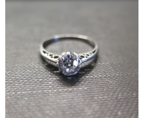 A diamond single-stone ring - The old-cut diamond to the tapered shoulders and plain band - Estimated diamond weight 0.85ct  