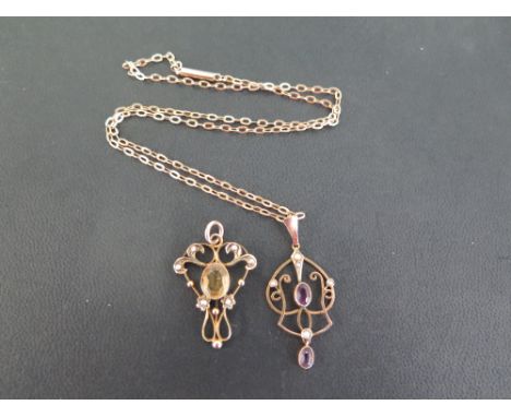 Two early 20th century 9ct gold pendants - Both set with seed pearls, one with citrine, one with amethyst - One suspended fro