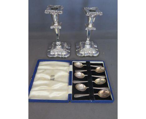 A pair of weighted silver candlesticks 18cm tall Birmingham 1900/1901 maker W D and a boxed set of six silver tea spoons appr