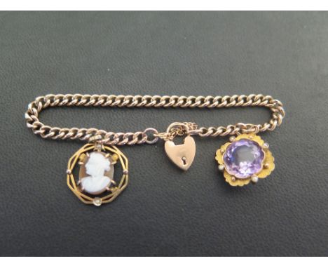 An early to mid 20th century 9ct gold curb-link bracelet - Suspending an amethyst and seed pearl charm and a cameo and seed p