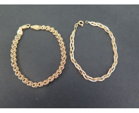 A tri-colour woven bracelet - Stamped 750 - Length 17cms - Weight approx 4.3gms - Together with a 9ct gold fancy-link bracele