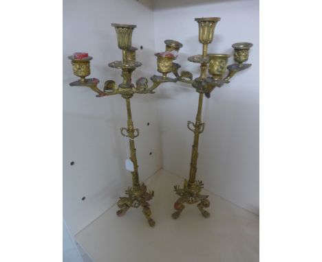 A pair of three branch ormolu candlestick - Height 53 cm 
Condition report: Slight bending, missing decorative chains