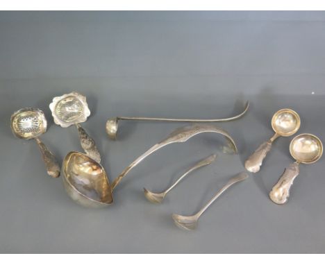 A large Continental silver ladle - probably Paris and a group of seven Dutch and Belgium ladles and castors with hallmarks fo