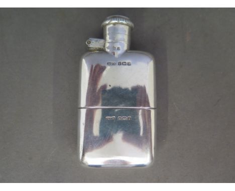 A silver hallmarked flask Birmingham 1933-34 2.5 troy oz