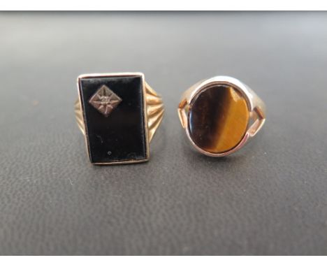 Two 9ct gold signet rings -  To include tigers eye and onyx and diamond - Hallmarked London and Birmingham - Ring sizes M 1/2