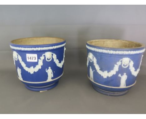 A near pair of 19th century Wedgwood dark blue Jasperware jardiniere with garlands between, lion mask pattern with classical 
