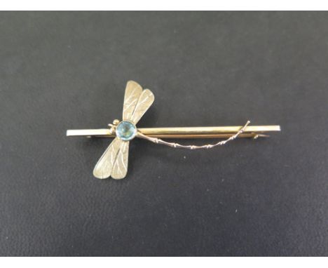 A dragonfly bar brooch - Set with a blue stone - Stamped 9ct - Length 7cms - Weight approx 4.2gms
Condition Report: Good to f