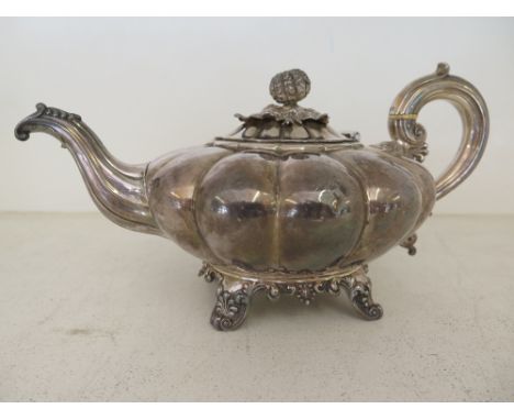 A silver hallmarked teapot - London 1831-32 - maker Edward, Edward Jun. John and William Barnard - foliate finial with bulbou