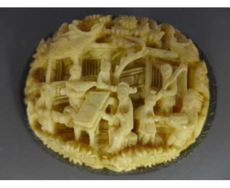 A pre 1947 carved ivory brooch - Depicting an Oriental scene within a gilt metal frame 
Condition Report: Good to fair - Ivor