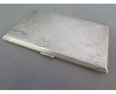 A good Walker and Hall Art Deco style silver cigarette case with engine turned decorated to the exterior and interior - size 