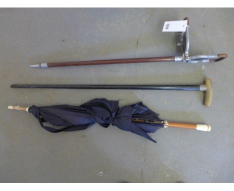 An Elite Shooting stick, a horn handled cane and a vintage ivory handled umbrella 
Condition report:  Base clip missing to sh