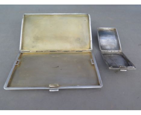 An Isnik silver small hinged case and a sterling silver cigarette case approx 7.5 troy oz