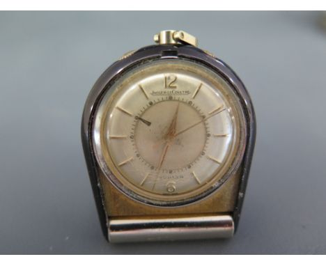 Jaeger le Coultre Turler pendant alarm watch with Arabic numerals and baton markers and centre alarm disc, the hinged front c