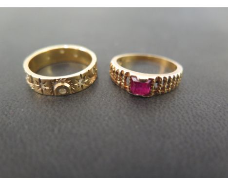 An 18ct gold white gem-set full-circle band ring - Hallmarked London - Ring size L - Together with a synthetic ruby dress rin