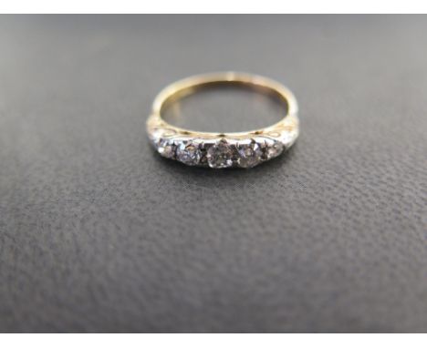 An old-cut diamond five-stone ring -Stamped 18ct - Ring size R - Weight approx 2.7gms
Condition Report: Good to fair - With l