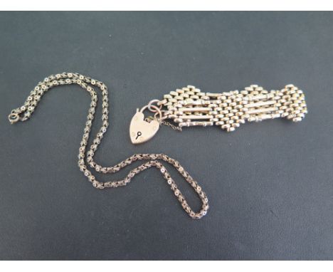 A good quality 9 ct gold fancy gate bracelet with hear padlock clasp - Weight approx. 21.5 grms and an unmarked fancy chain -
