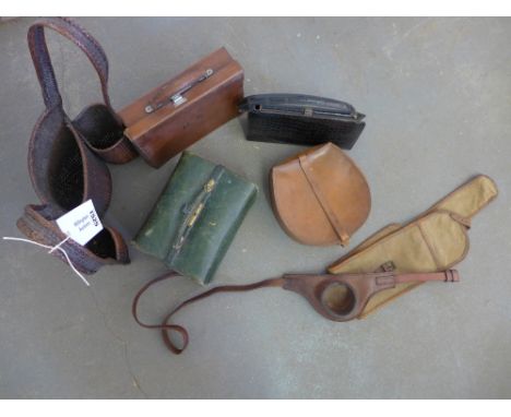 Two vintage leather cases, a collar box, handbag, gun wrap, wicker bottle carrier and a flag belt 