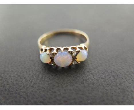 An 18ct gold opal and diamond dress ring - Partial hallmark - Ring size Q 1/2 - Weight approx 1.9gms
Condition Report: Good t