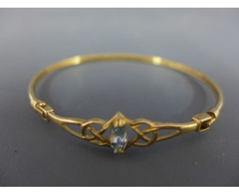 A 9ct gold aquamarine hinged bangle - Hallmarked Birmingham - Inner diameter 6.5cms - Weight approx 6.4gms
Condition Report: 