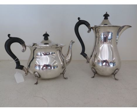 A silver hallmarked teapot - Birmingham 1924-25 -Weight approx. 39 troy oz and a matching coffee pot