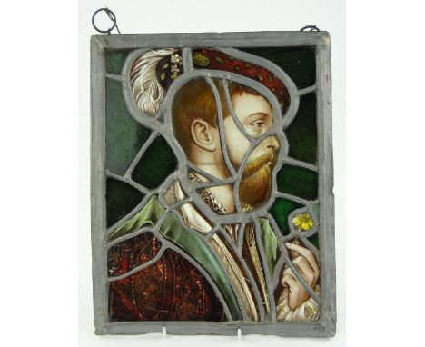 Antique lead light stained glass panel depicting a Medieval Nobleman,
height 12".