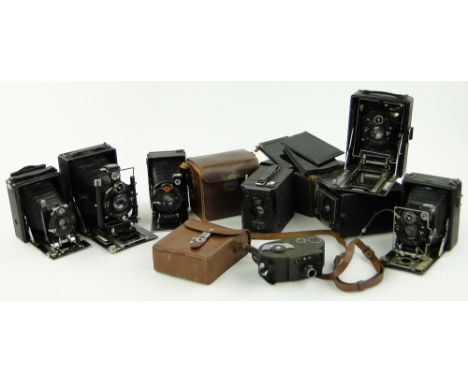 Various Vintage folding cameras,
leather cased cameras, etc.