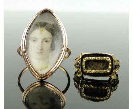 An Antique unmarked gold mourning ring,
with inset watercolour, portrait of a lady, inscribed on reverse "Rest In Peace," pan