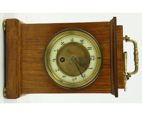 An Edwardian mahogany cased mantel clock with single train movement,
height 9".