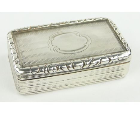 A George IV rectangular silver snuff box,
makers marks TS, Birmingham 1828, length 6.5cm.
