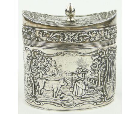 19th century Dutch white metal tea caddy of oval form,
with relief decorated farming scenes, marked 90, length 8cm.