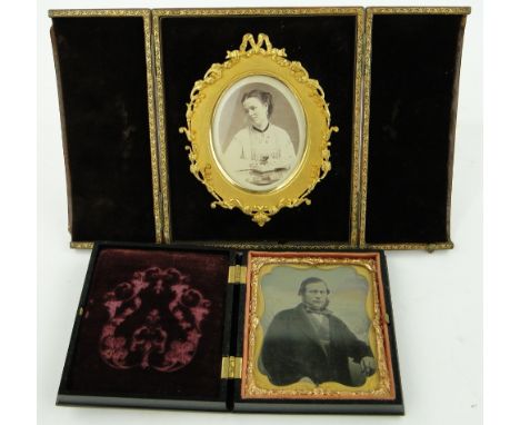 Victorian oval gilt framed miniature portrait of a lady,
in fitted leather case with strut, height 5.25" overall and a gilt f